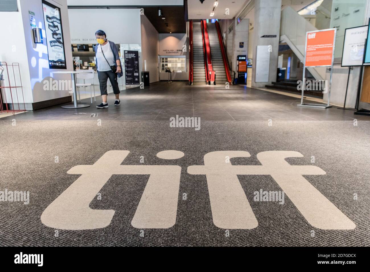 Toronto, Ontario, Canada. 11th Sep, 2020. A person wearing a face mask at TIFF Bell Lightbox which is nearly-empty during 2020 Toronto International Film Festival, mostly a virtual festival this year. Credit: Shawn Goldberg/SOPA Images/ZUMA Wire/Alamy Live News Stock Photo