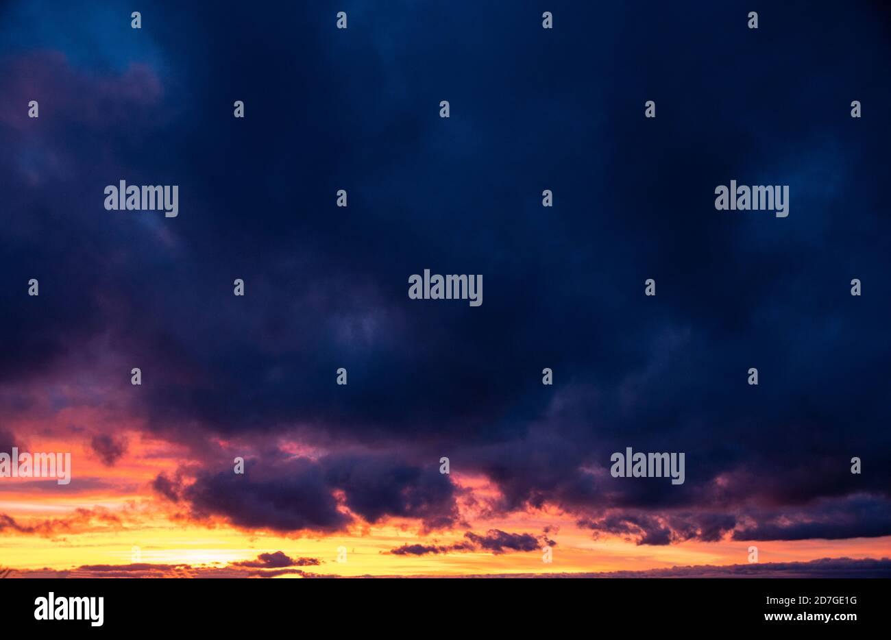 Dark skies at sunset Stock Photo