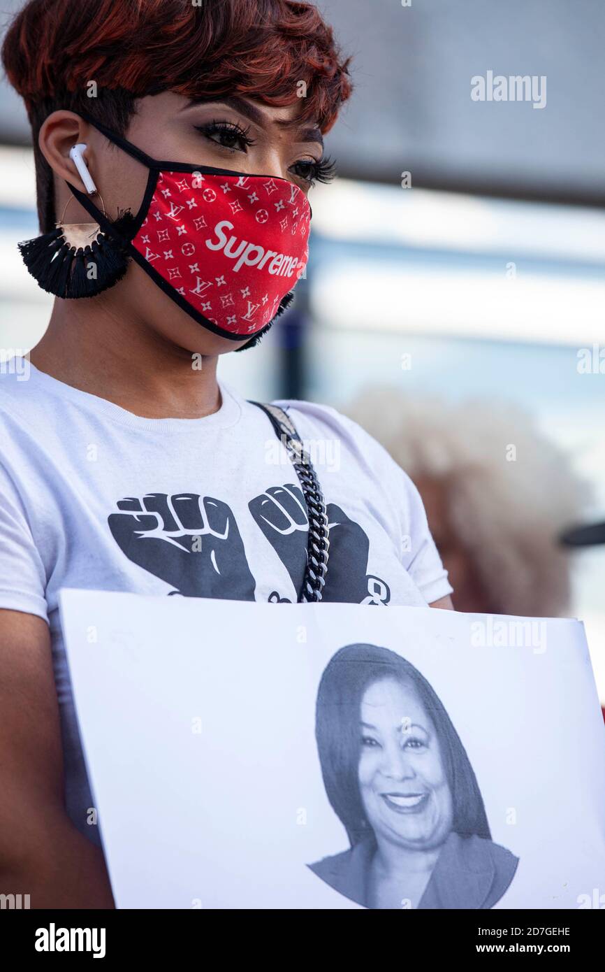 Tionna Barnes, a former Columbus Police Department dispatcher from 2012 to 2018, stands in support of McFadden.Melissa McFadden, a 24 year veteran of the Columbus Police Department, released a book titled 'Walking the Thin Black Line: Confronting Racism in the Columbus Division of Police' in September of 2020, and has received a significant backlash for condemning many of the CPD's actions as 'racist'. McFadden and her supporters held a protest in front of the Division of Police in downtown Columbus, Ohio to support McFadden and to continue to speak out against police brutality and racism with Stock Photo