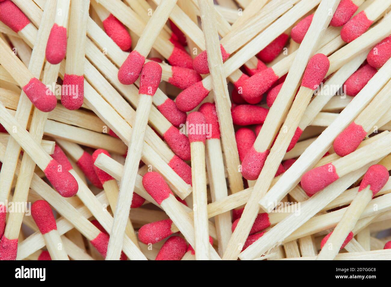Closeup texture background of many the match stick is stacked in bright light. Top view and copy space for article. The concept of flammable or fire h Stock Photo