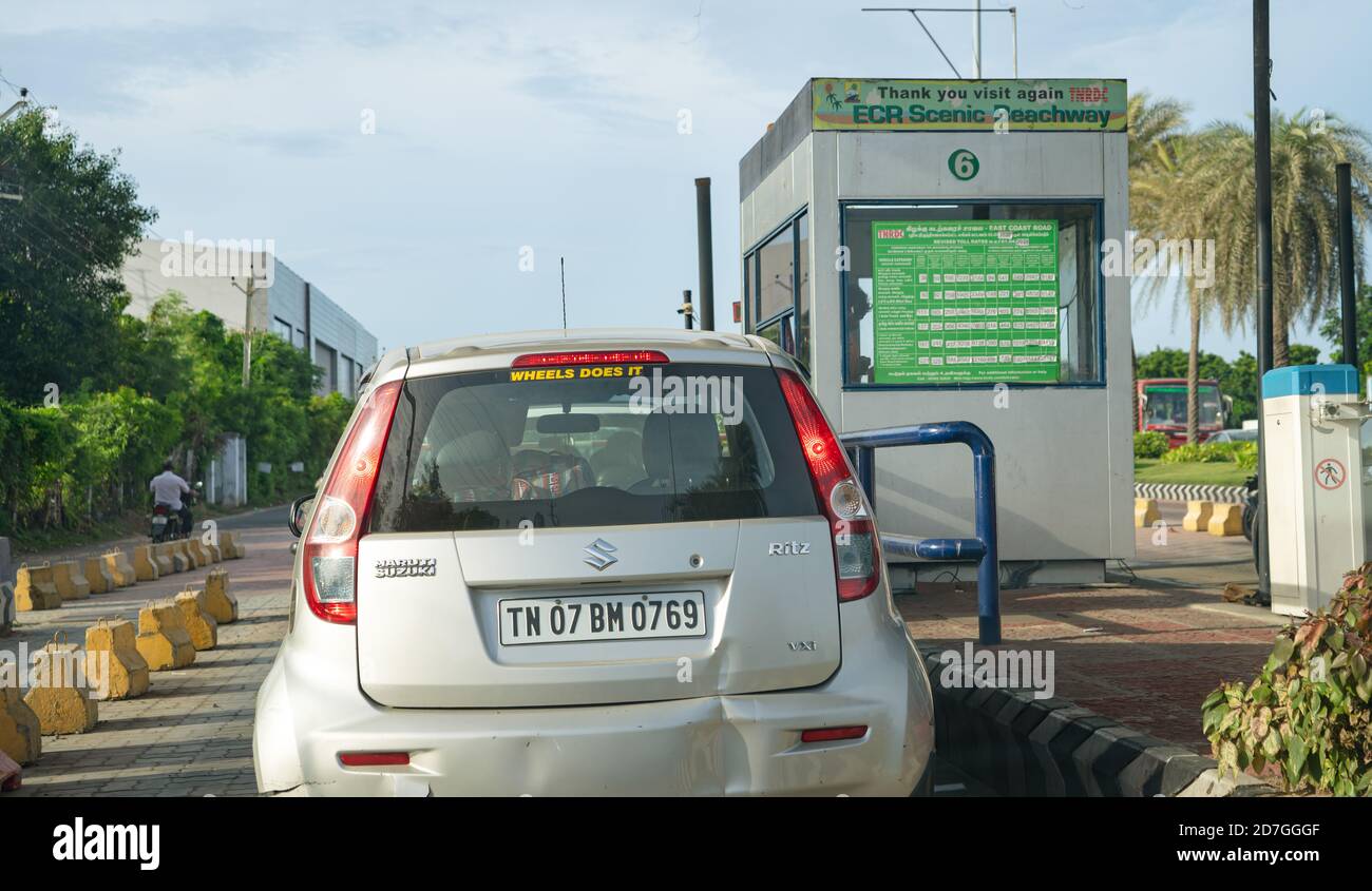 A car waits in line at the Uthandi Toll Plaza, one of the well-known toll plazas on the scenic East Coast Road highway. Stock Photo
