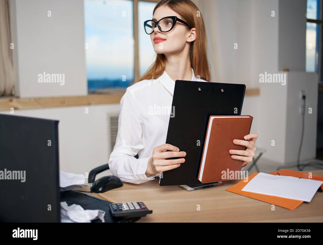Business woman in white shirt at work tables documents office official ...