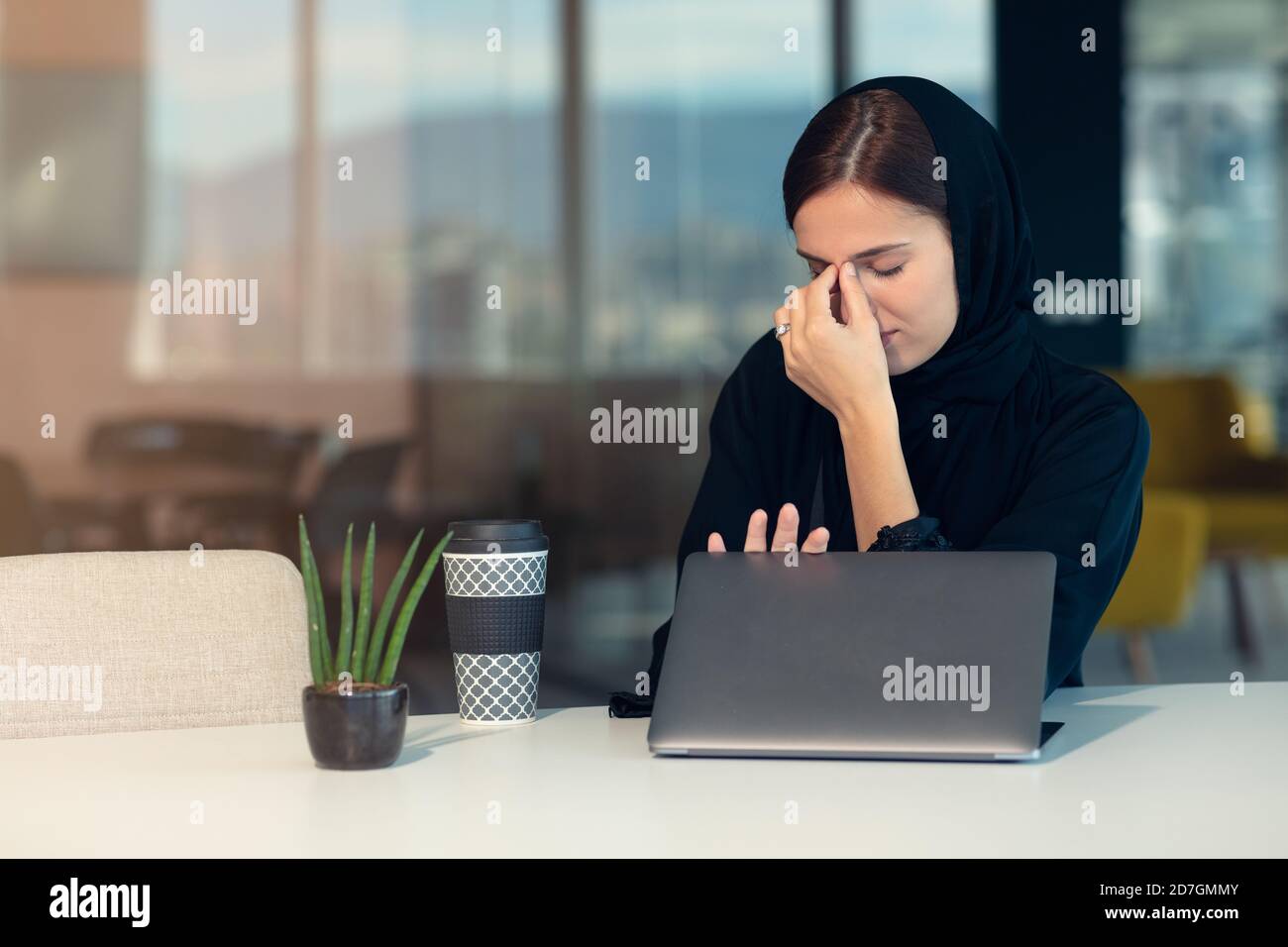 professional young female muslim worker having problem Stock Photo