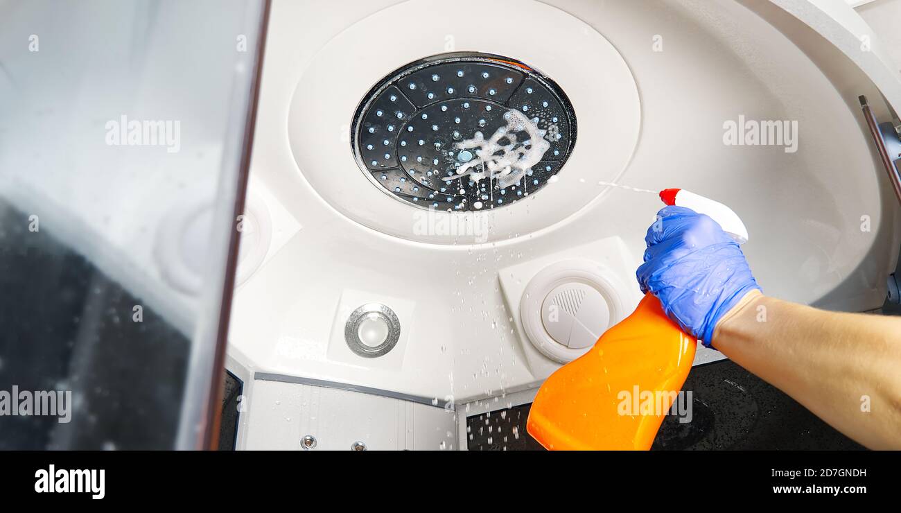 Cleaning of shower steam cabins from calcium deposits. Cleaning in the