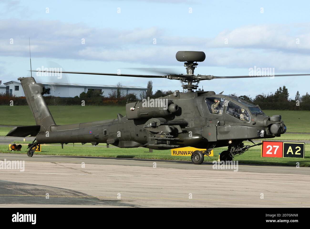 Army Air Corps AH-64 Apache helicopter in to Gloucester Staverton for re-fuelling. Stock Photo