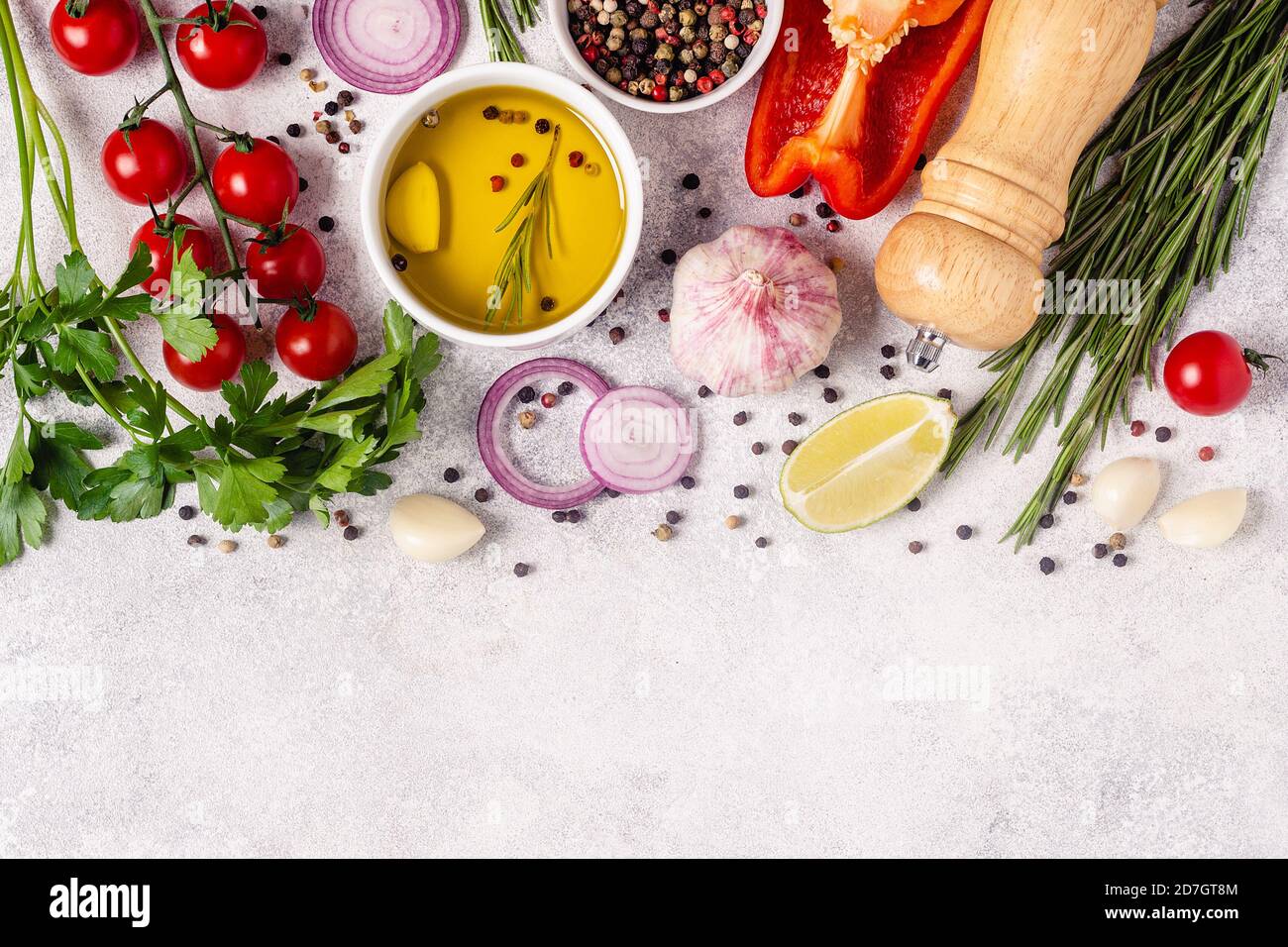 Herbs and condiments on light stone background. Top view with copy ...