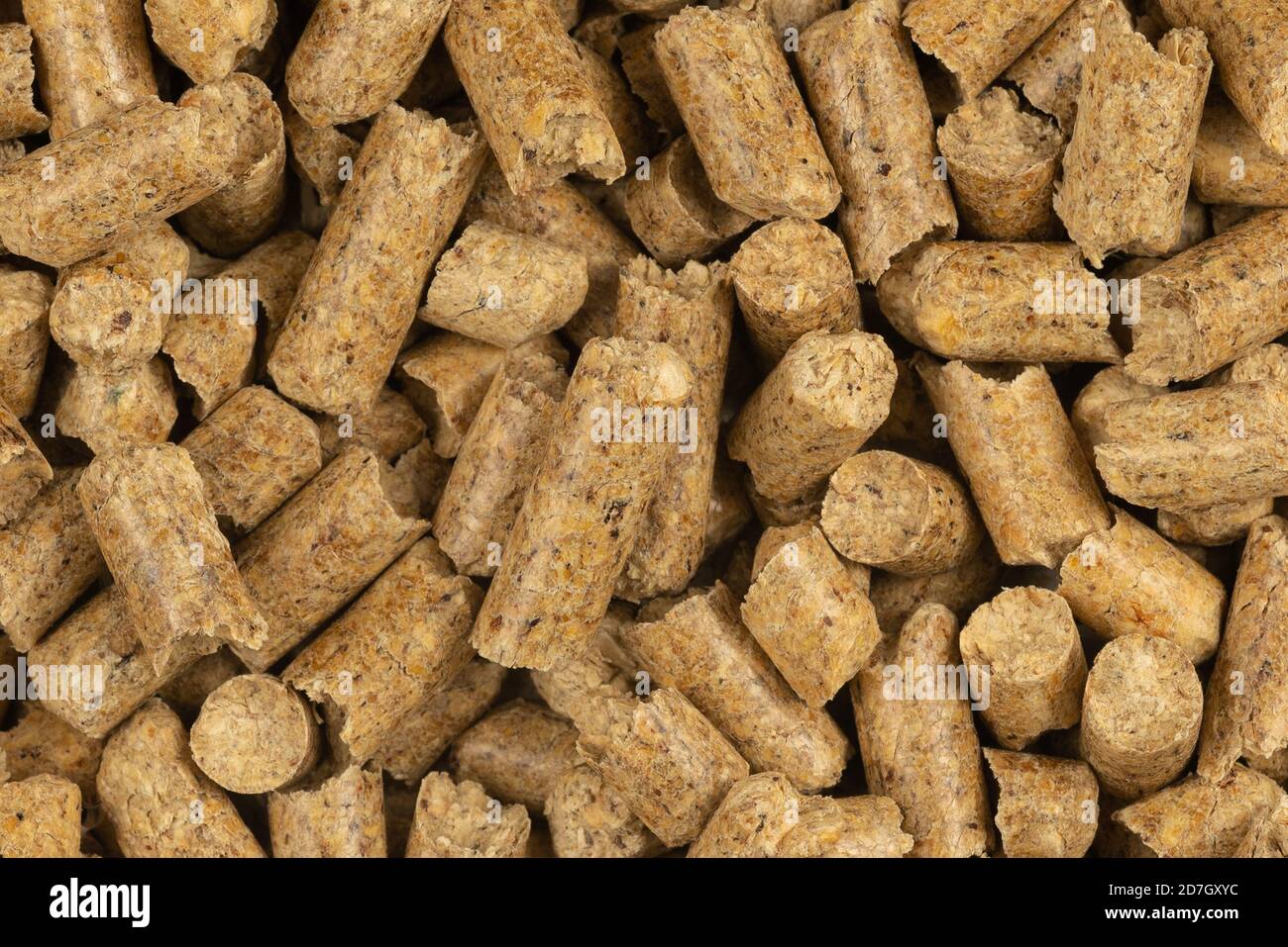 Brown wood pellets texture background. natural pile of wood pellets