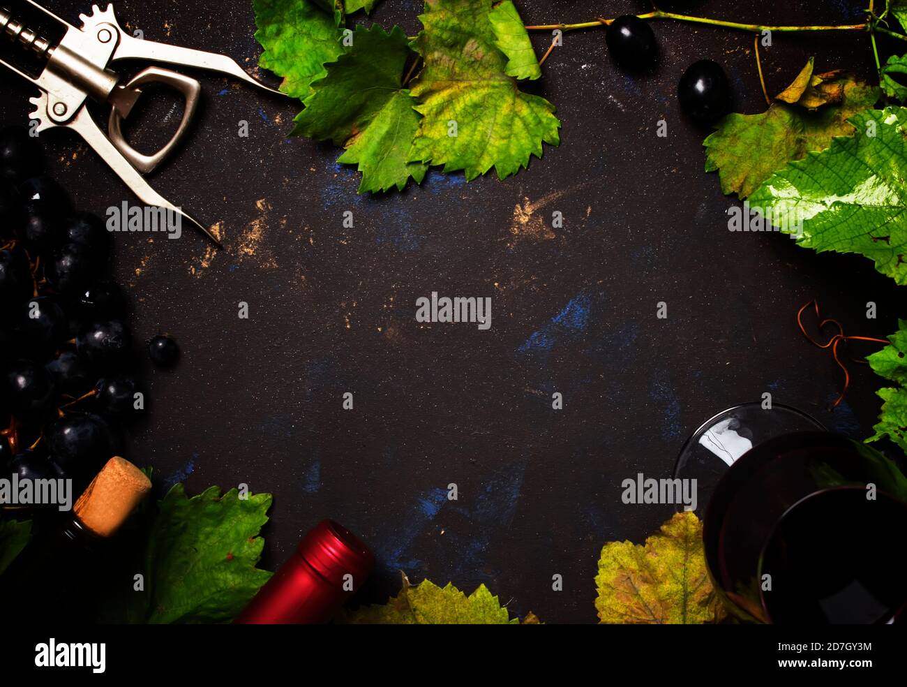 Red wine from grape varieties sauvignon, black food background
