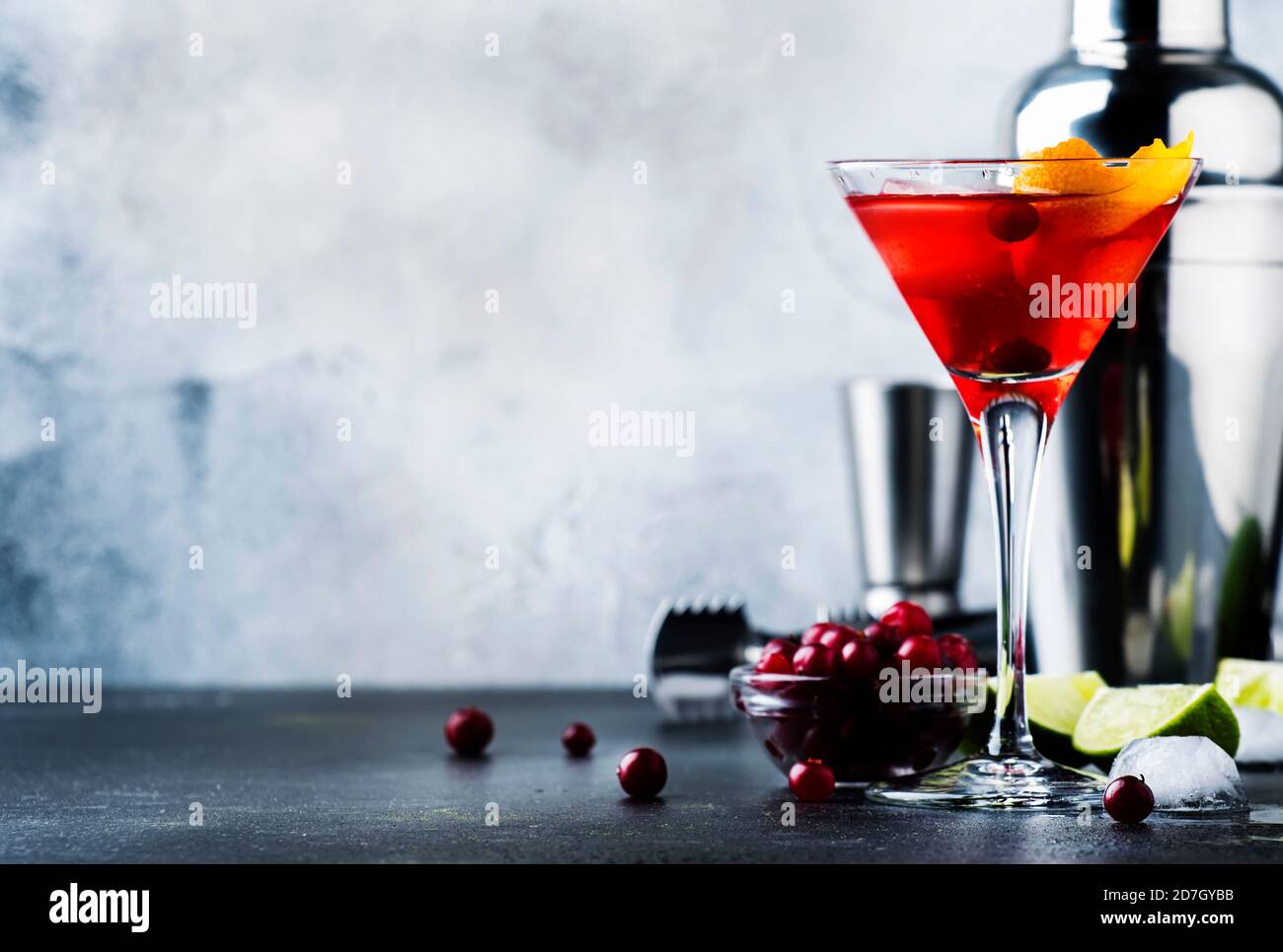 Cosmopolitan cocktail with vodka, liqueur, cranberry juice, lime, ice