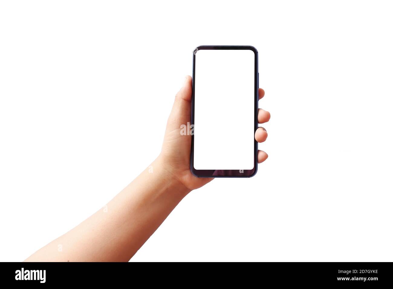 The hand is holding the white screen, the mobile phone is isolated on a white background with the clipping path. Communication concept. Stock Photo