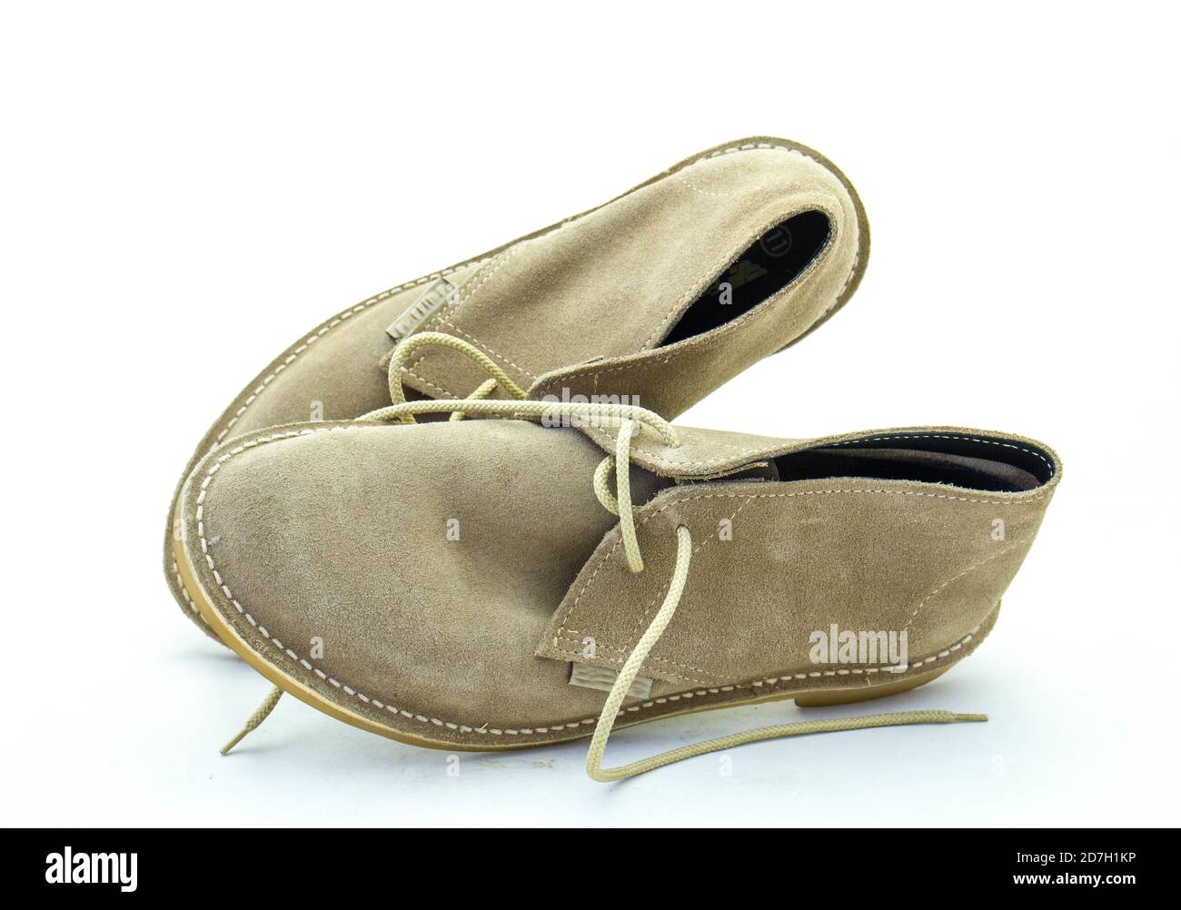 A pair of traditional South African velskoene shoes isolated on a clear background image with copy space in horizontal format Stock Photo