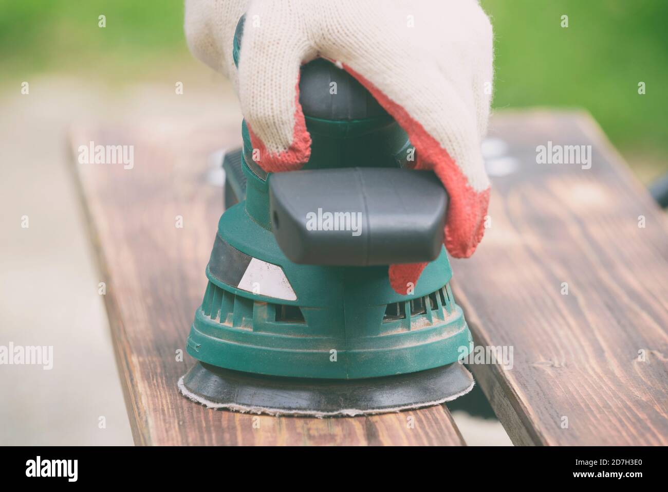 Sanding a wood with orbital sander outdoor Stock Photo Alamy