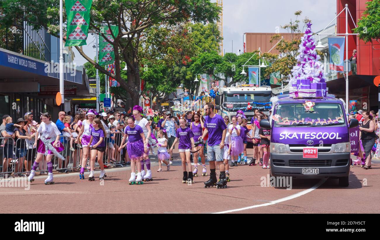 Students of a skating school taking part in a Christmas parade. Tauranga, New Zealand Stock Photo