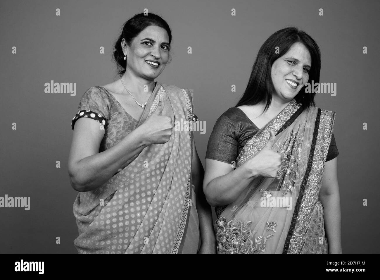 Two mature Indian women wearing Sari Indian traditional clothes together Stock Photo