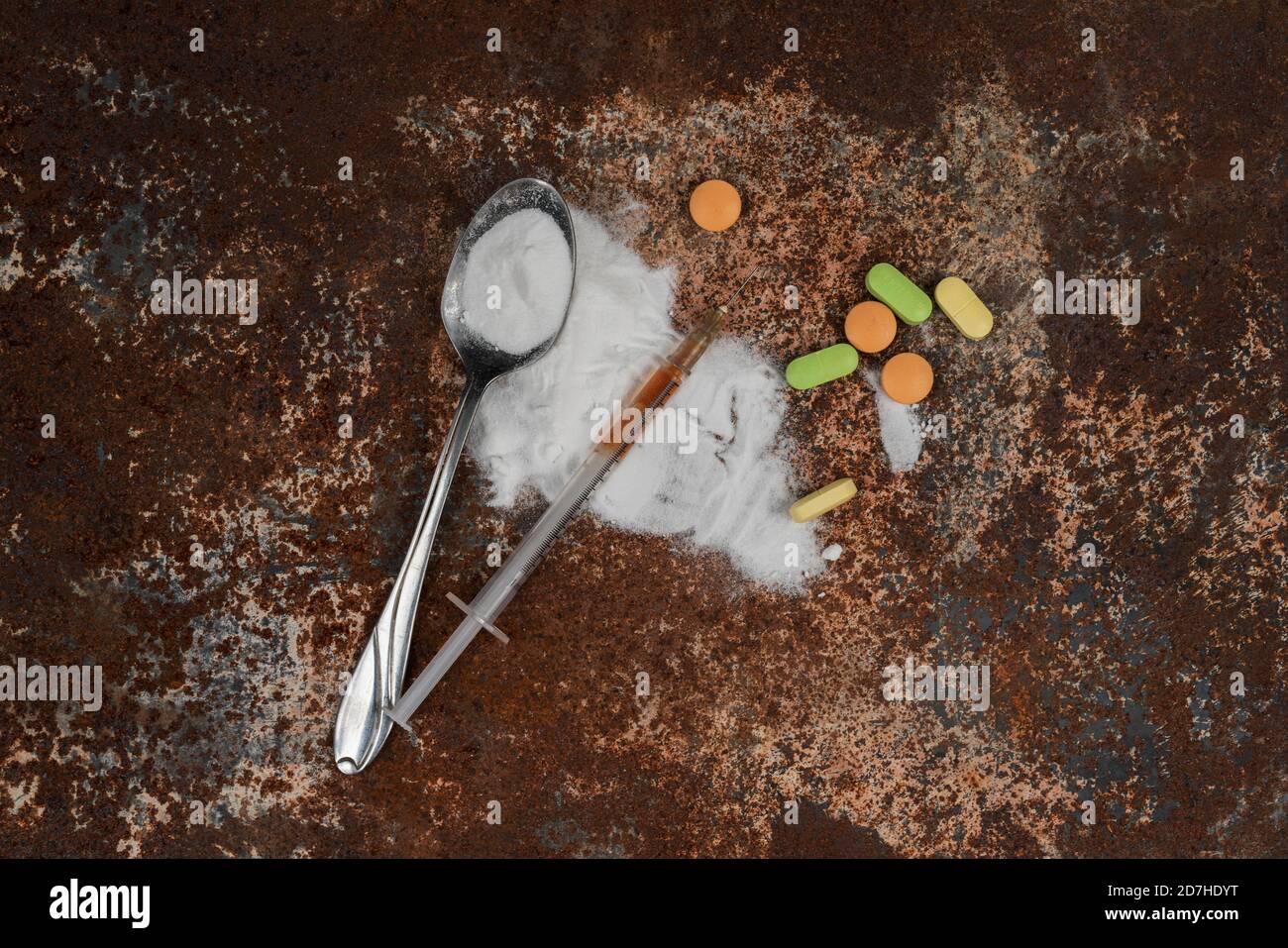Syringe and drugs on dirty rusty background. Injection syringe ...