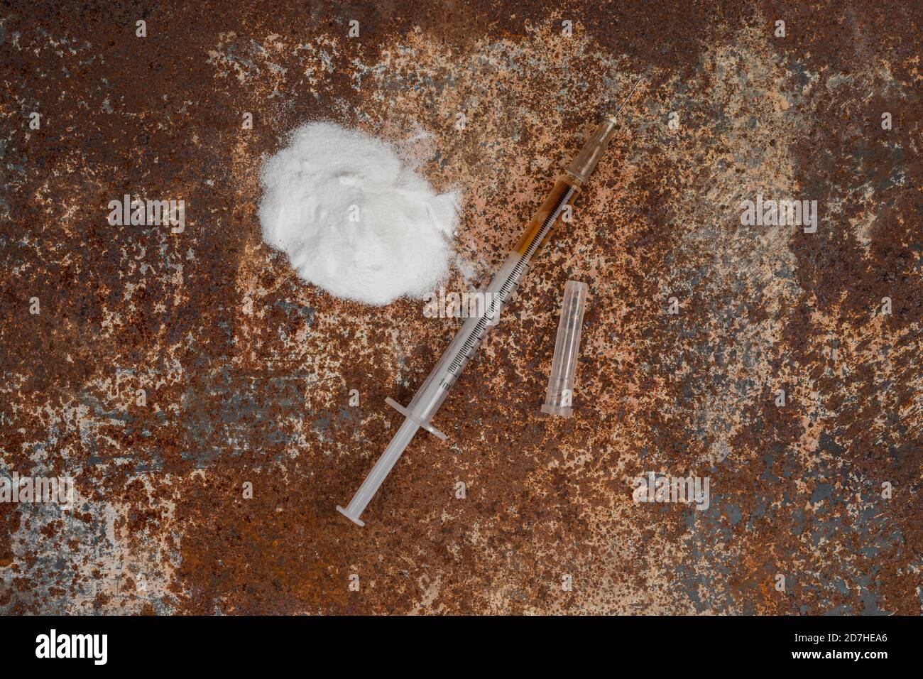 Syringe and drugs on dirty rusty background. Injection syringe ...