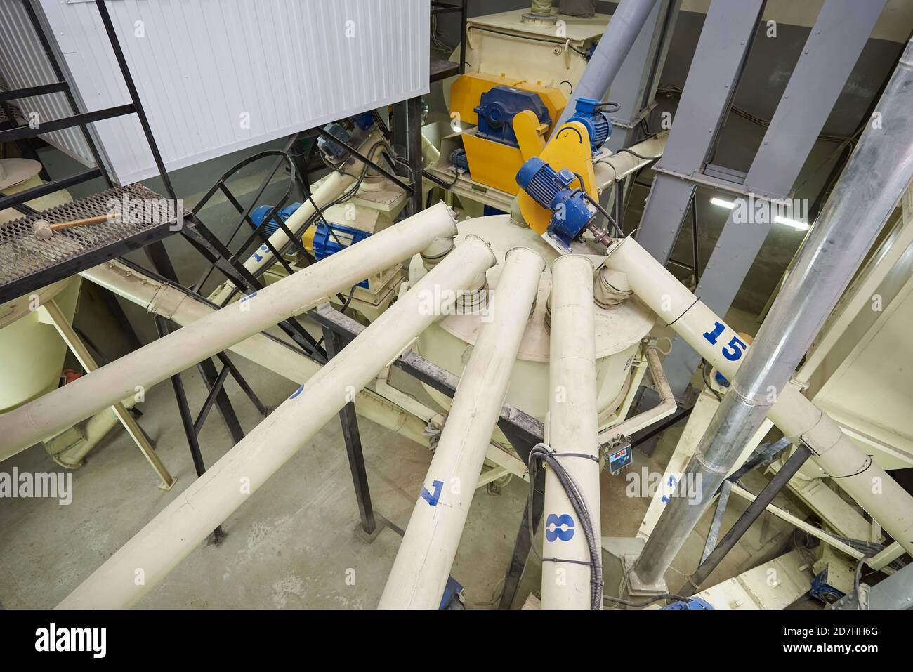 Equipment for mixing ingredients in an animal feed plant Stock Photo