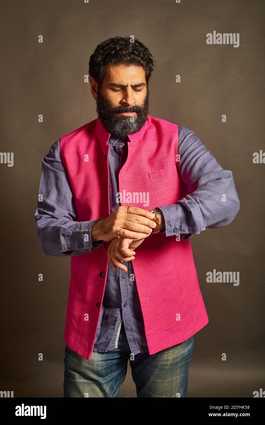 A young Indian man with a typical 'artist' and 'intellectual' look ...