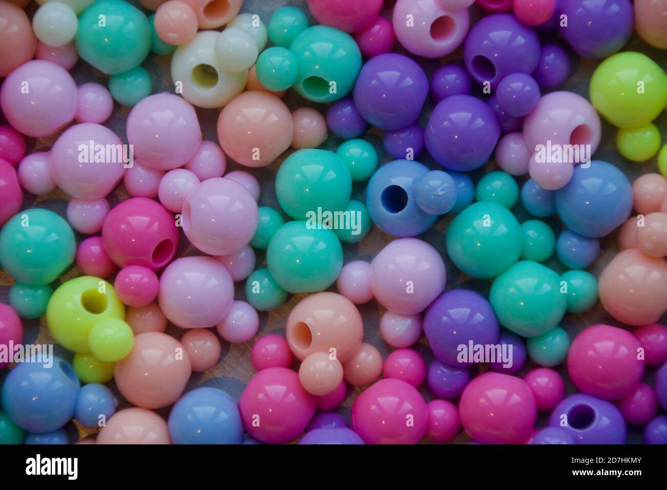 Cluster of coloured spheric-shaped beads. Stock Photo