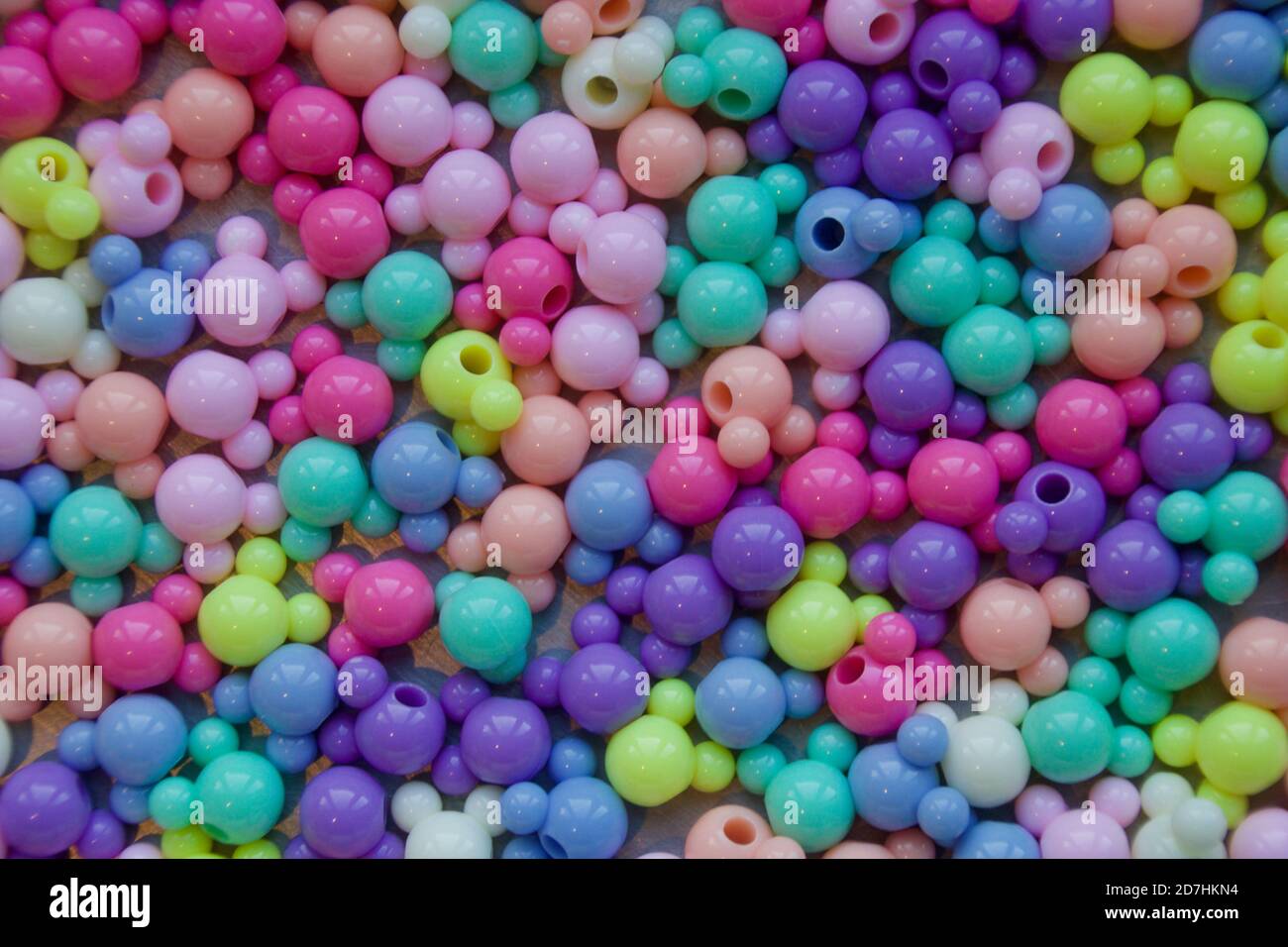 Cluster of coloured spheric-shaped beads. Stock Photo