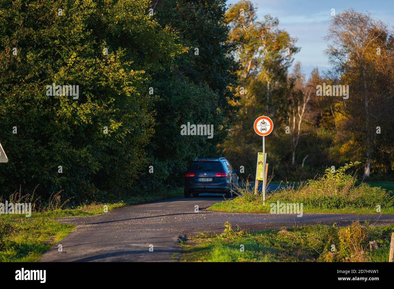 October 21, 2020  Hude Germany: A car drives into a zone in the country where no cars or motorcycles are permitted Stock Photo