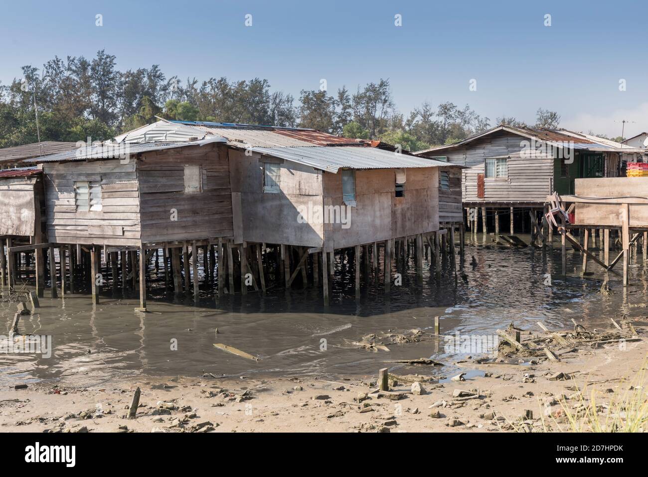Houses and shops on pilings in river, Miri, Malaysia Stock Photo