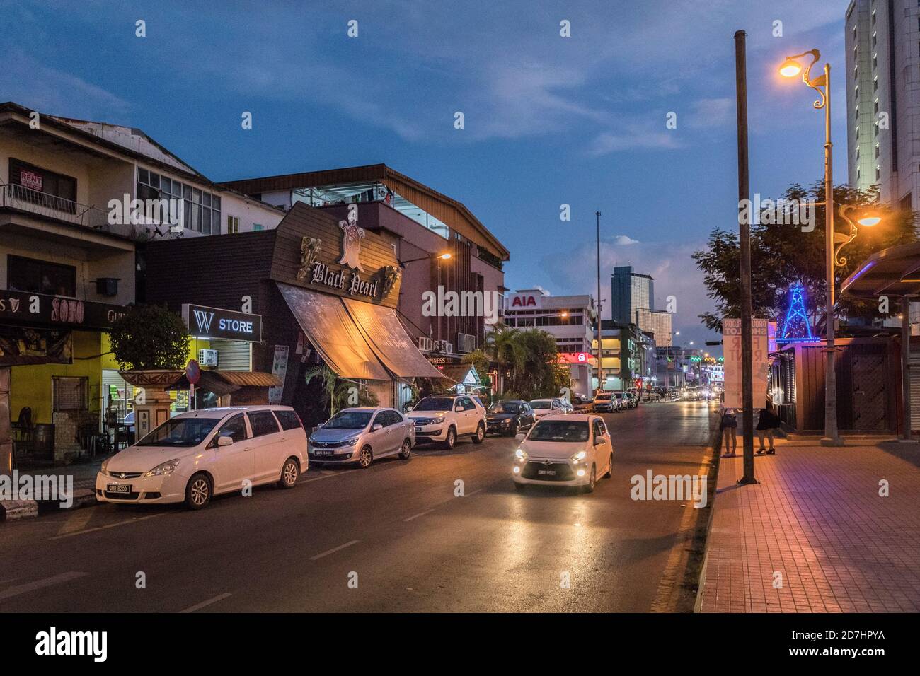 Driving at night through Miri, Malaysia Stock Photo