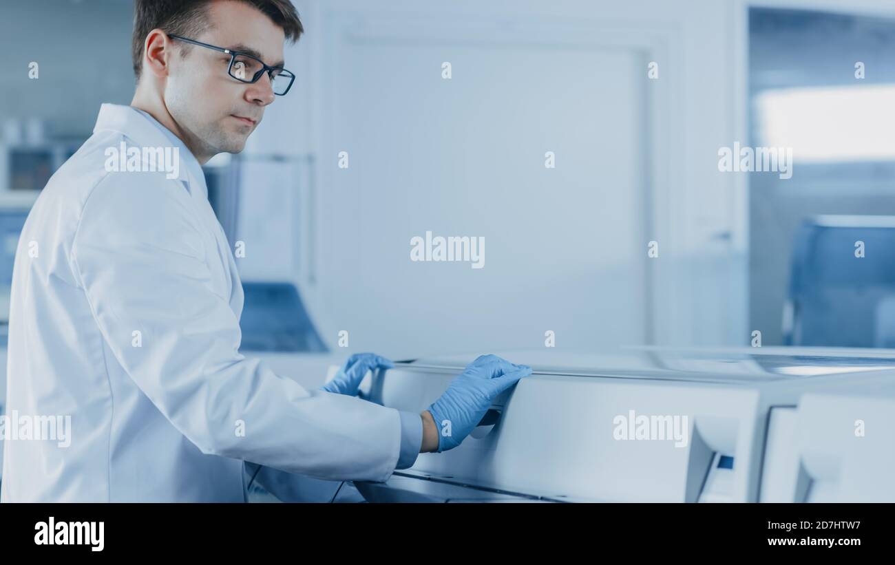 Research Scientist Works Blood Analyzing Machine. Innovative