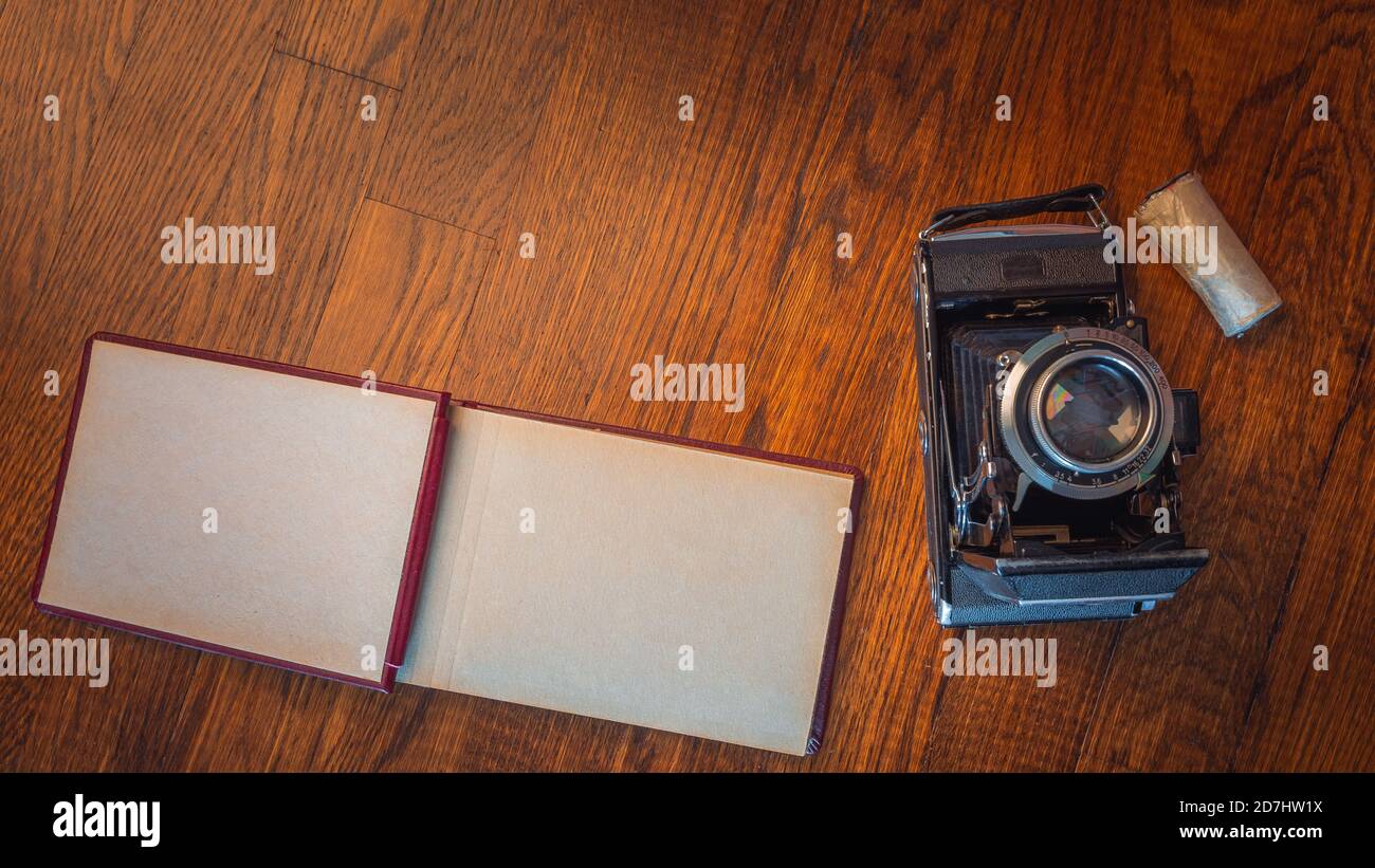 Notebook mock up for artwork with film camera Top view. Stock Photo