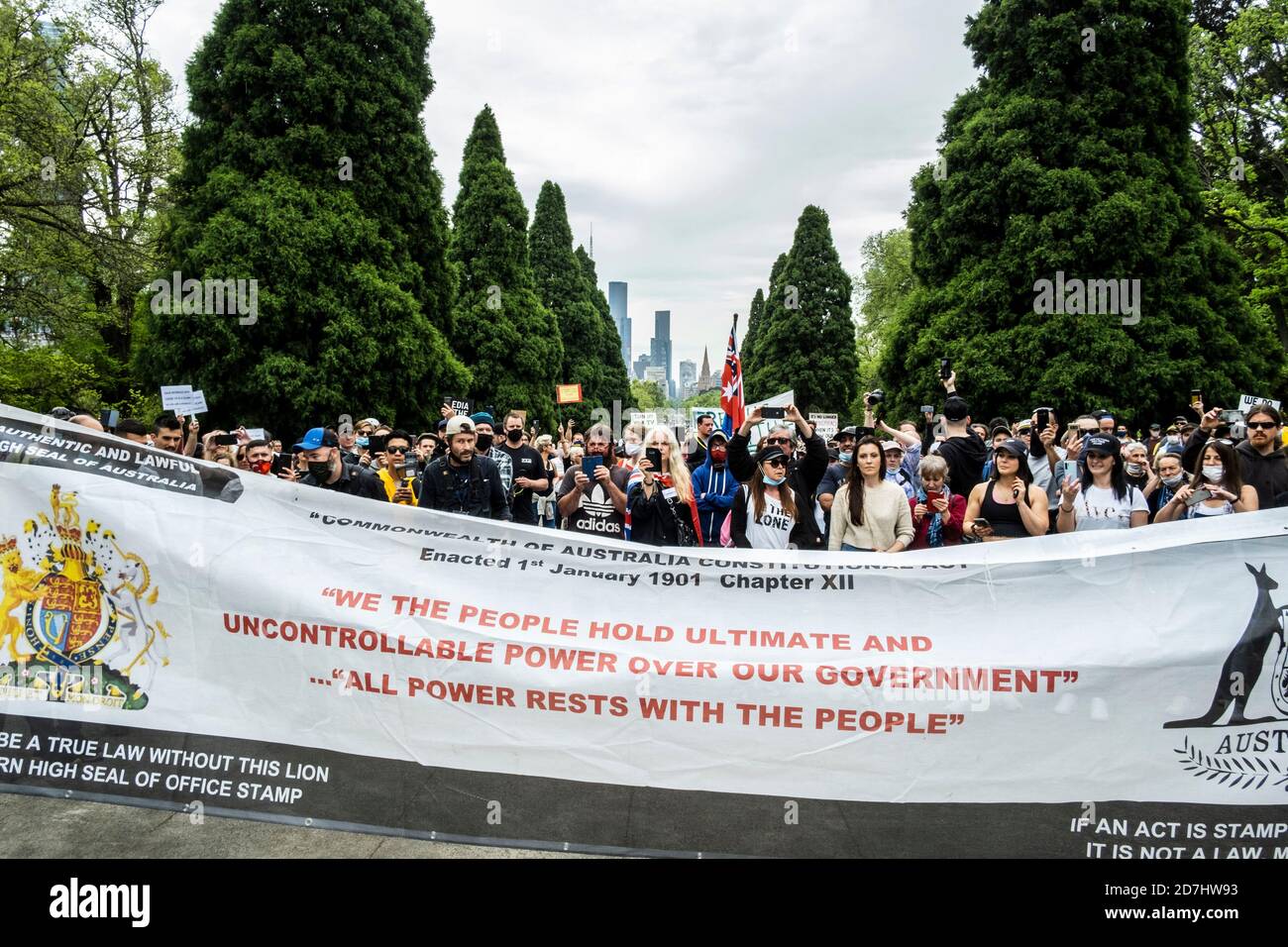 Melbourne, Australia. 23rd Oct, 2020. Protesters hold a banner at the Shrine of Remembrance during the demonstration.About 200 to 300 protesters gathered for Freedom Day rally in opposition to Covid19 restrictions. The protest started at Melbourne Shrine Remembrance were protesters held placards while chanting slogans against the Premier Daniel Andrews tough restrictions due to Covid 19. Credit: SOPA Images Limited/Alamy Live News Stock Photo
