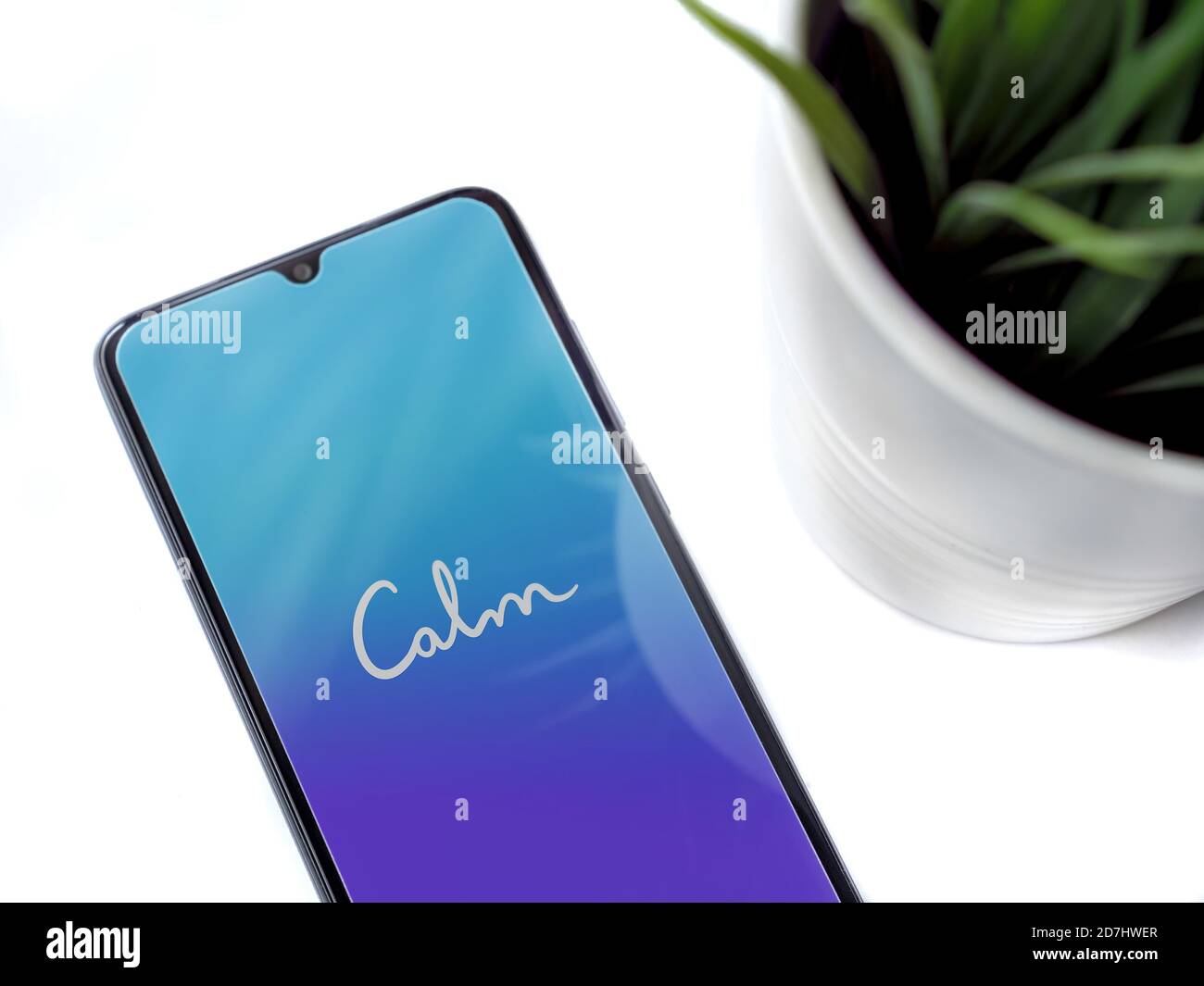 Lod, Israel - July 8, 2020: Modern minimalist office workspace with black  mobile smartphone with Calm app launch screen with logo on white background  Stock Photo - Alamy