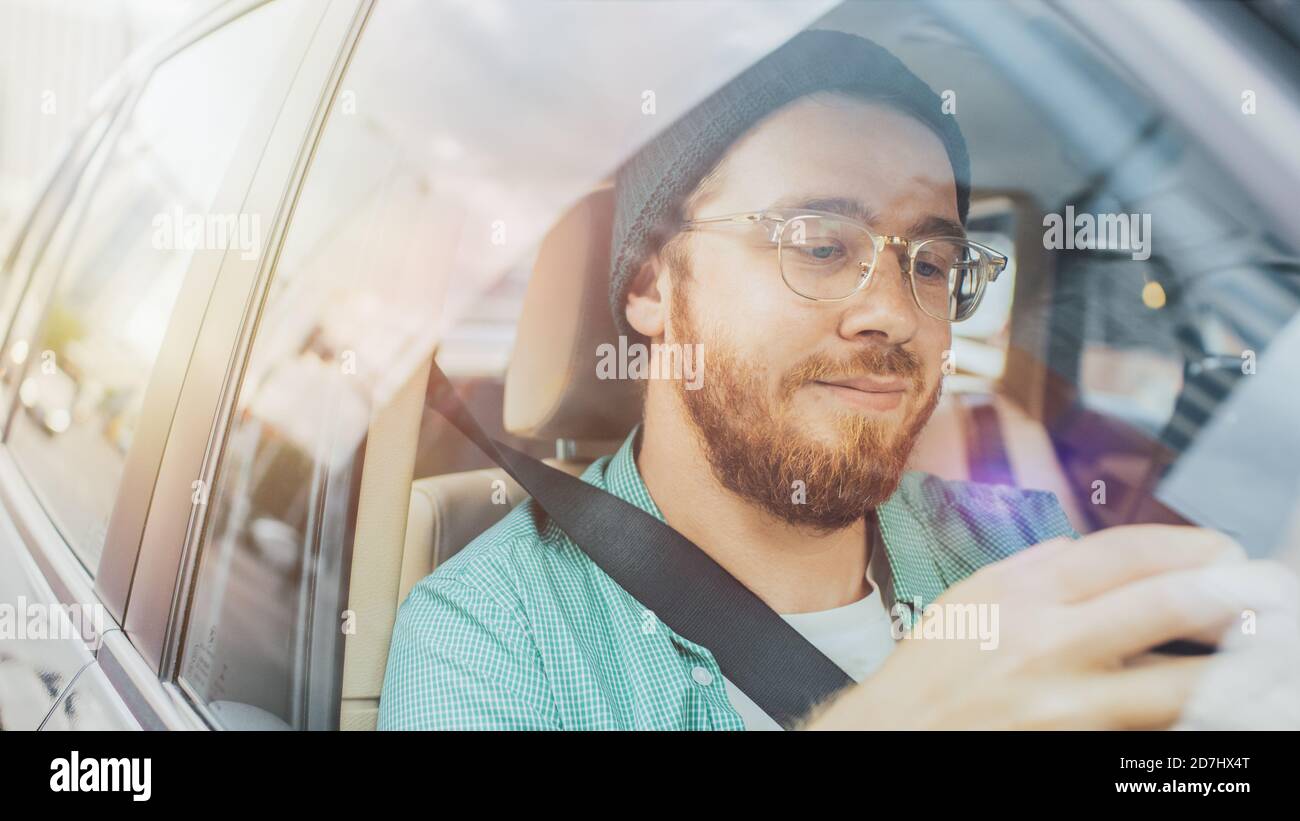 Handsome passenger in car hires stock photography and images Alamy