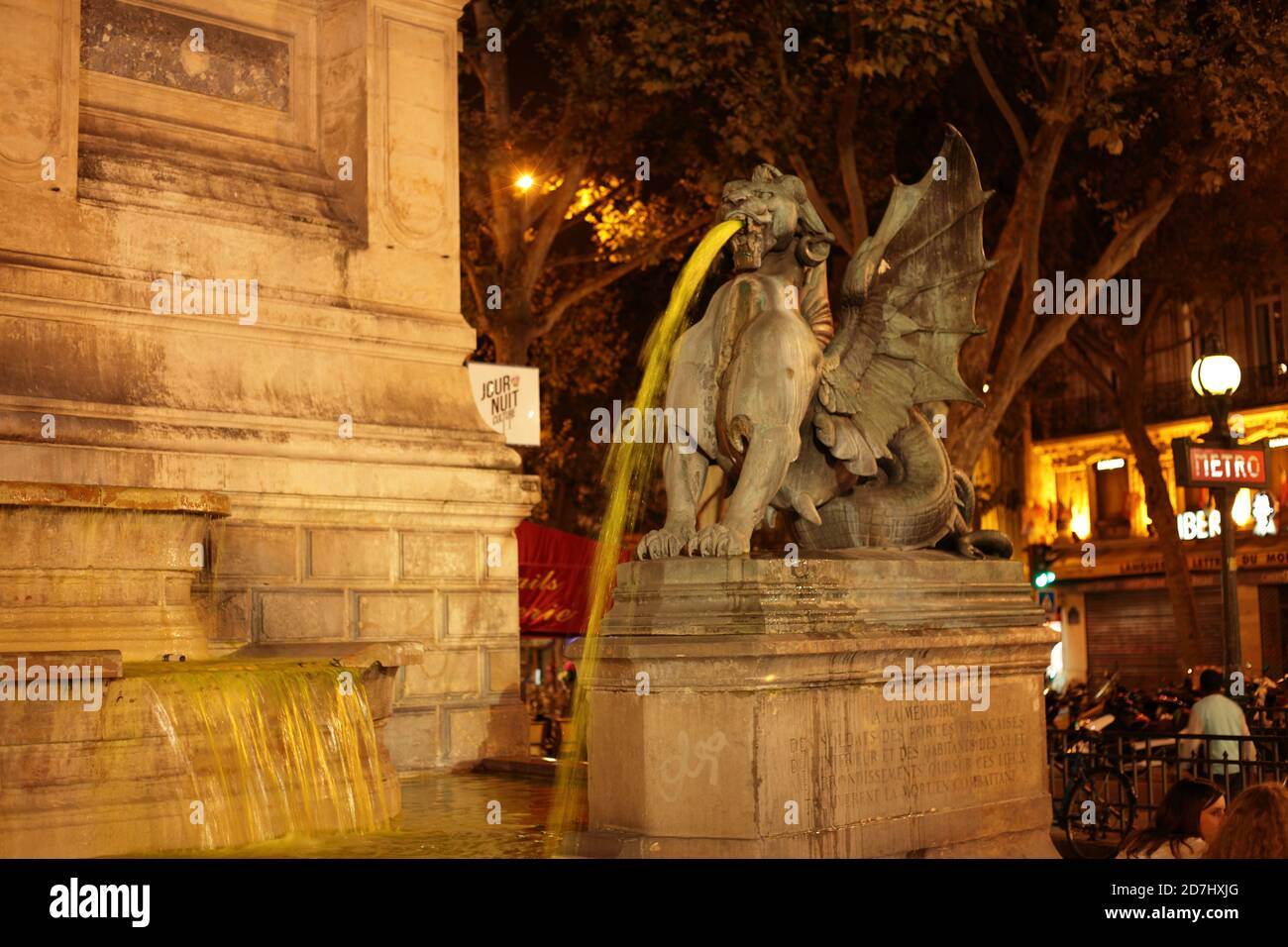 Angry pharmacists poured fluorescein into Parisian fountains to show their discontent with the government's pharmacy reform. Saint-Michel Fountain Stock Photo