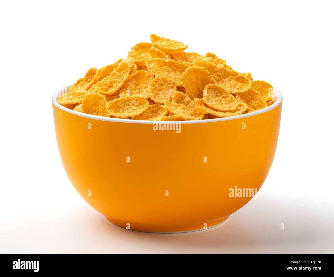 Corn flakes, bowl of cereal breakfast on white background, full depth