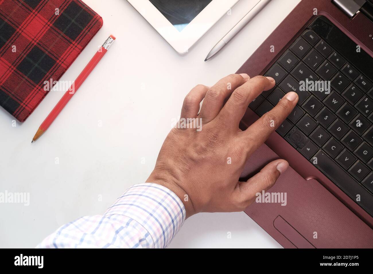 Close up of man hand typing on laptop. Stock Photo