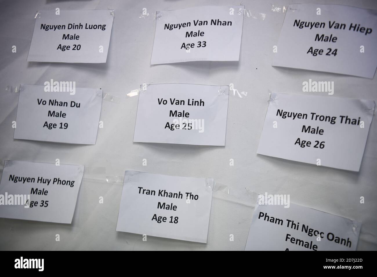 Victim's names on the wall of a memorial shrine at the Hackney Chinese Community Services (HCCS) in the Small Hall, Hackney, east London, on the first anniversary of the Essex container tragedy. Stock Photo