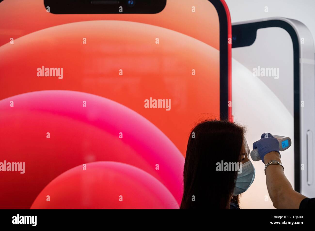 Hong Kong, China. 23rd Oct, 2020. A female customer has his temperature