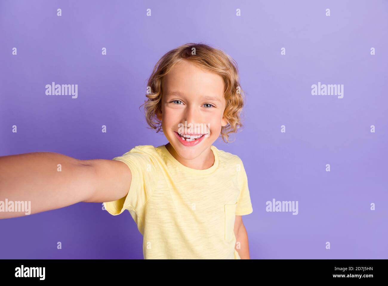 Photo of charming kid boy make self portrait wear casual style clothes ...