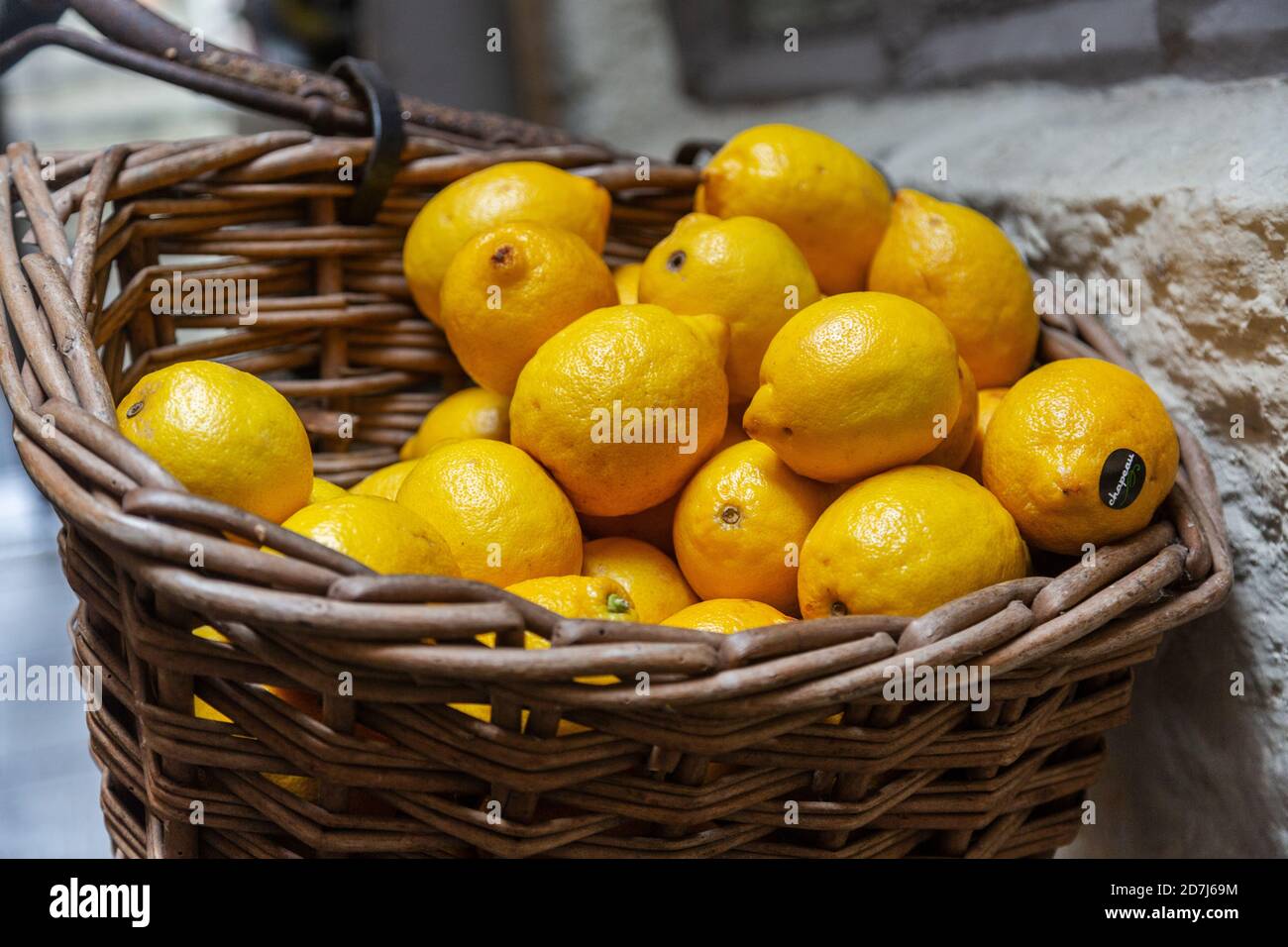Lemons in a bicycle basket Stock Photo