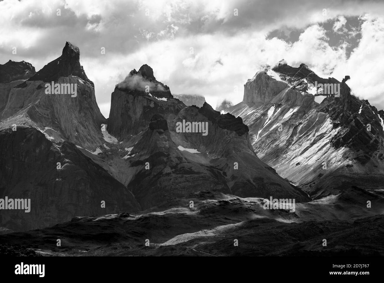 Black and white clouds over granite mountains of Torres Del Paine Stock Photo