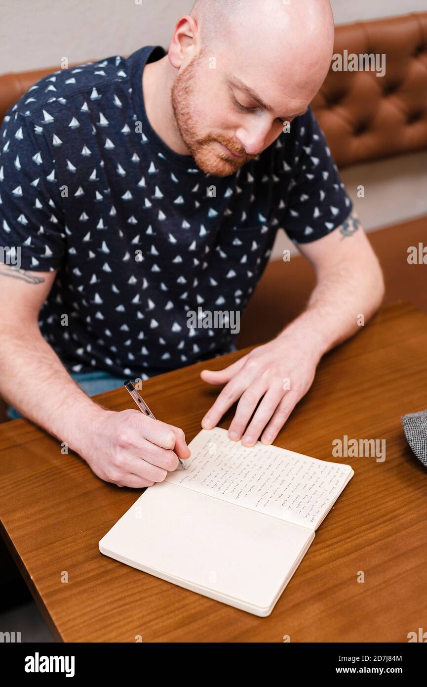 Adult notebook writing hi-res stock photography and images - Alamy