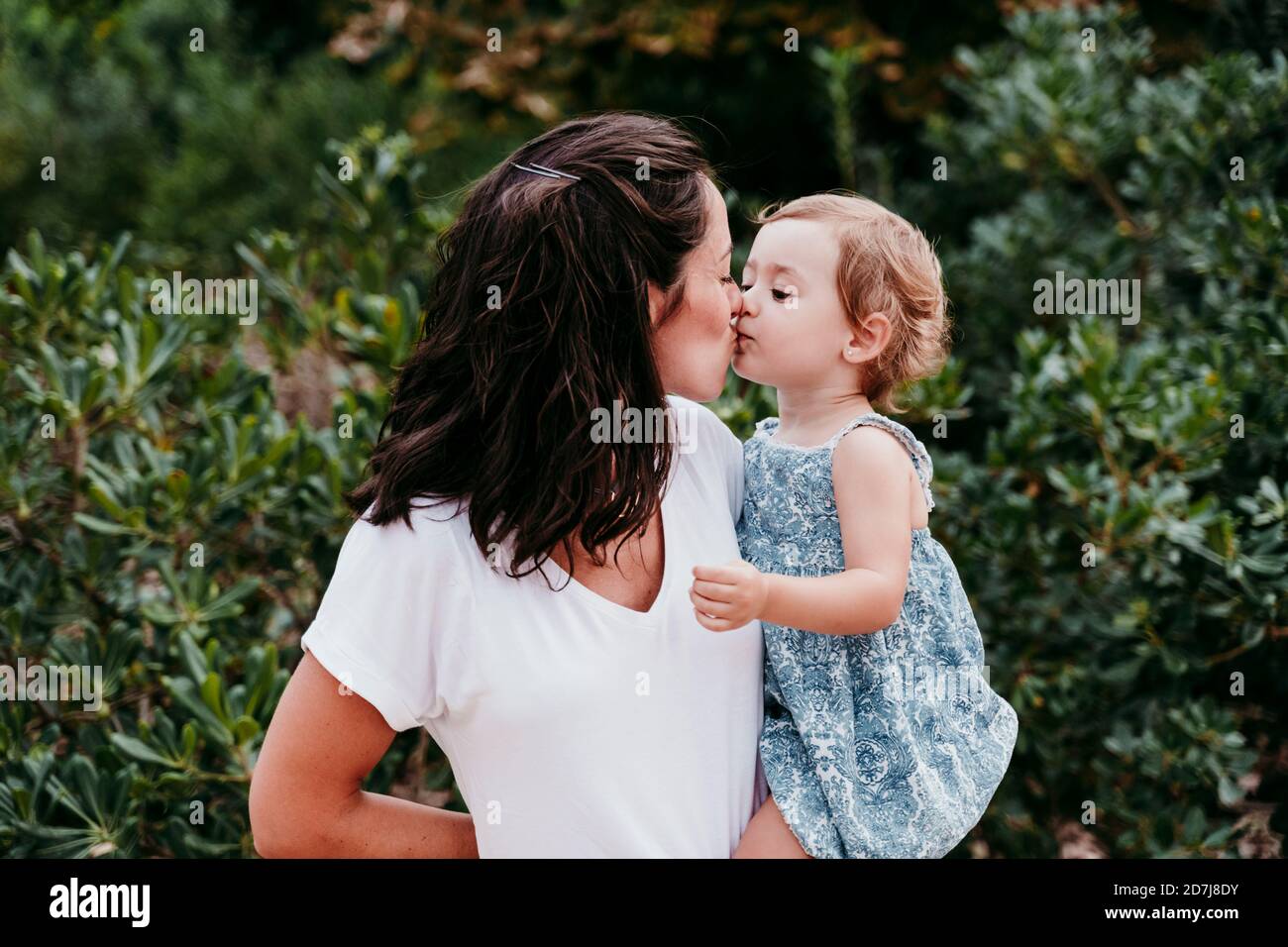 Mother daughter kissing other hi-res stock photography and images - Alamy