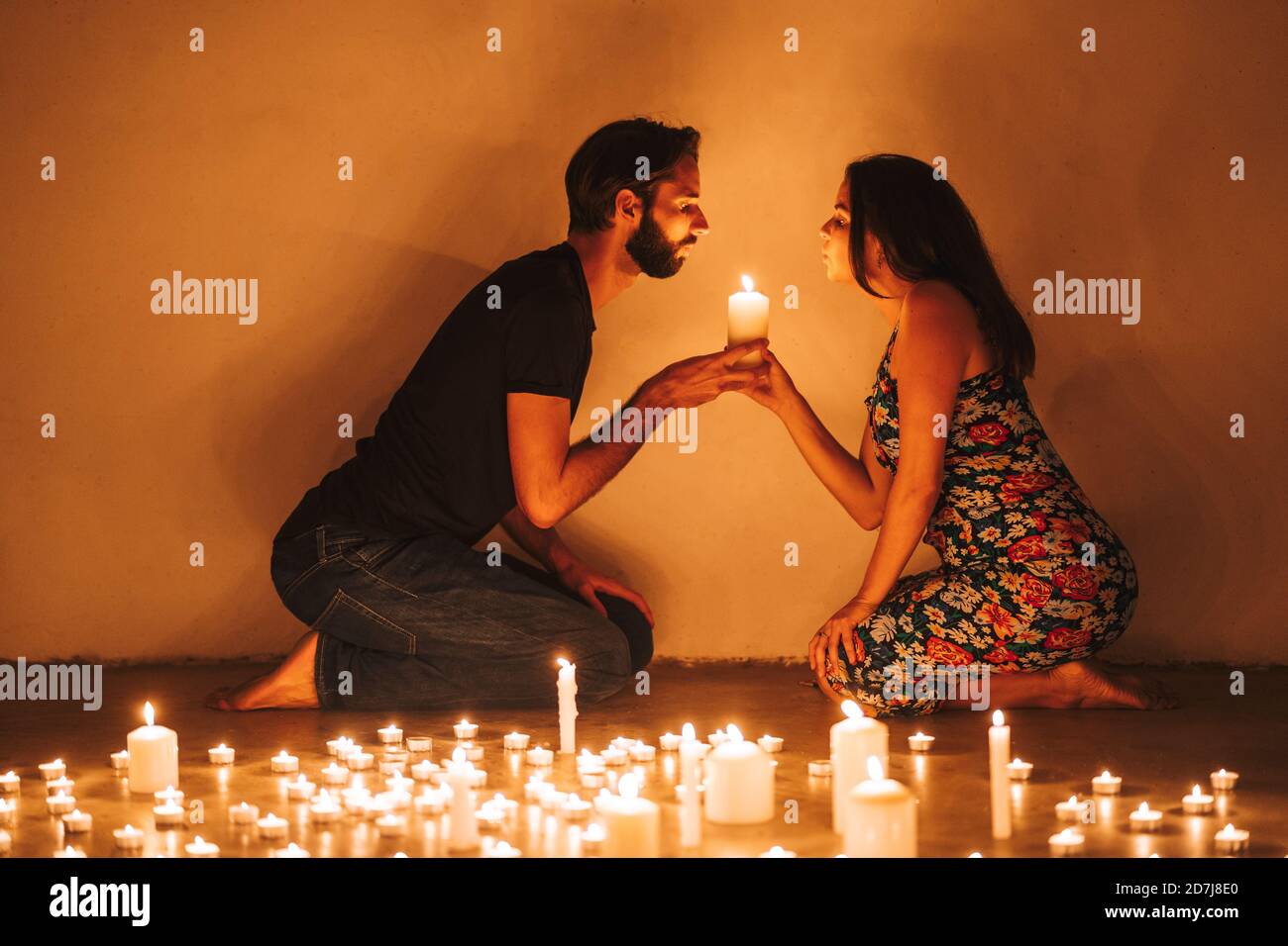 Man Holding Burning Match While Lighting Candles In Dark Kitchen During Power  Outage Stock Photo, Picture and Royalty Free Image. Image 194083174.