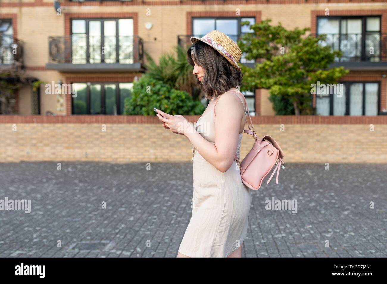 Beautiful woman walking street hi-res stock photography and images - Alamy