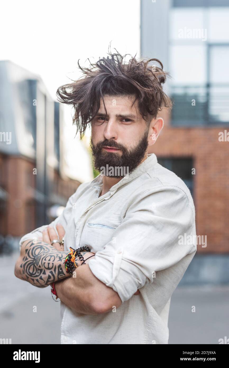 Tattoo man arms crossed hi-res stock photography and images - Alamy