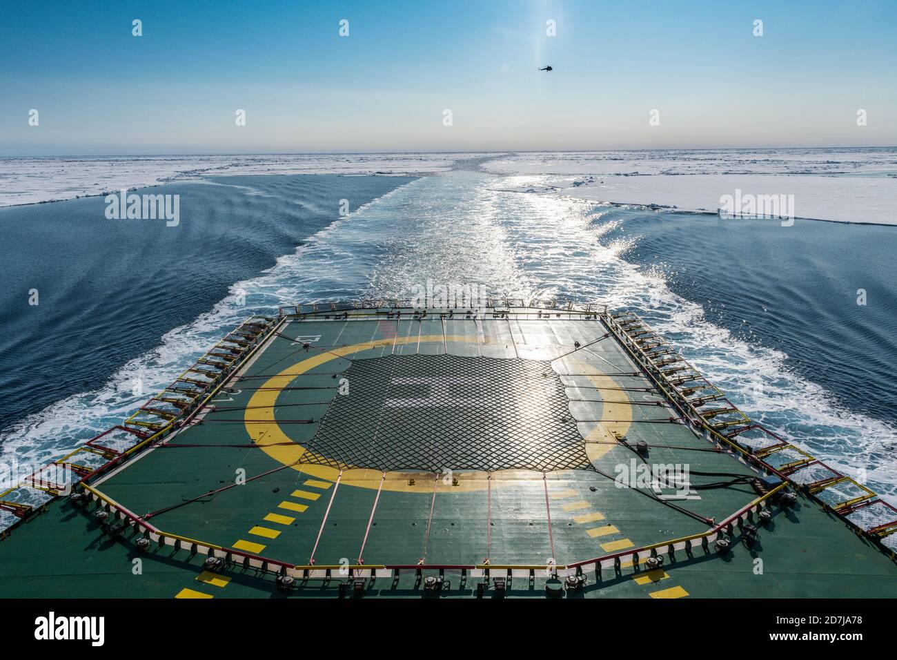Helipad of ice-breaker 50 Years of Victory cleaving through ice of Arctic Ocean Stock Photo
