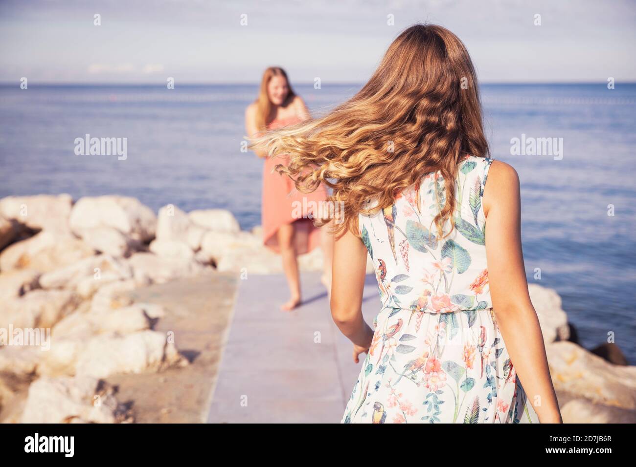 Three girls rear view hi-res stock photography and images - Alamy