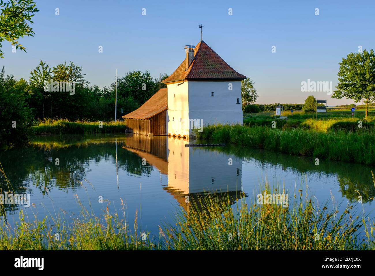 Germany, Bavaria, Adelsdorf, Lakeshore fishing museum in summer Stock Photo