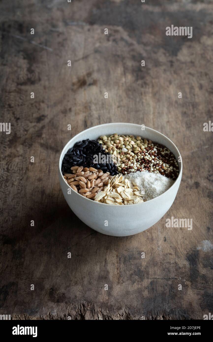 Bowl with different types of grains Stock Photo