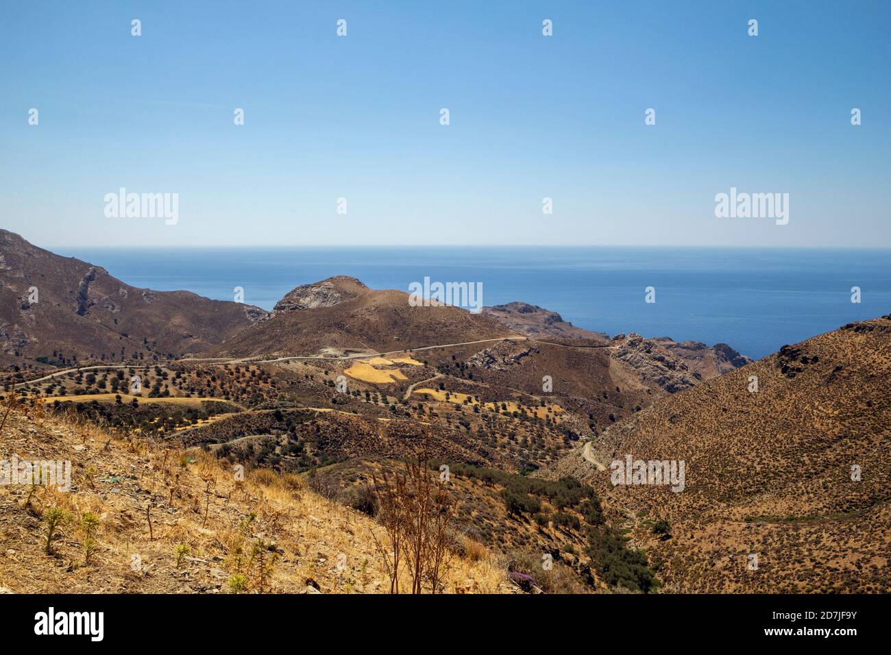 Greece, Crete, Lentas, Brown coastal landscape in summer Stock Photo